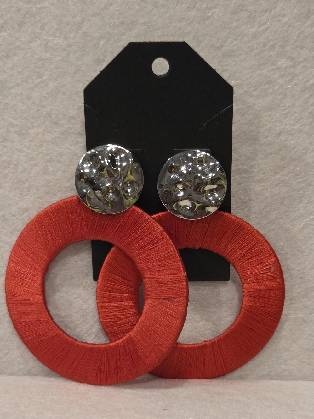 Stunng Red earrings with silver toned material, post back earrings..